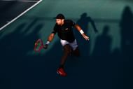 Arnaldi plays a volley in the Miami Open Presented by Itau 2025 - Source: Getty